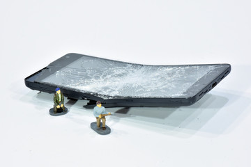 Cell phone with the screen broken by a hammer