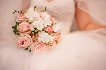 bride with wedding bouquet