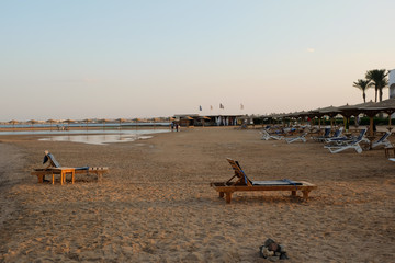Fototapeta na wymiar Hotels on the beach at sunset