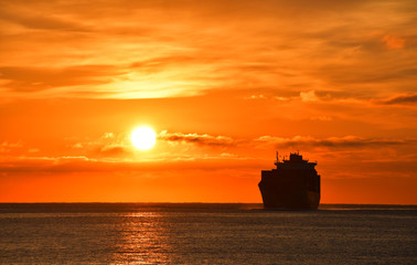 Sunrise - Container ship entering Genoa Port December 2018