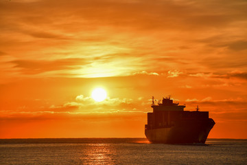 Sunrise - Container ship entering Genoa Port December 2018