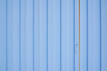 Blue metal iron sheet with vertical stripes.