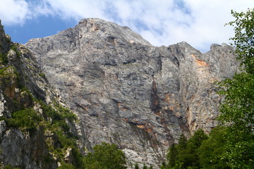 fantastic mountain slope with bright blue sky, natural landscape photo