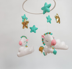mobile with different toys in the form of animals
