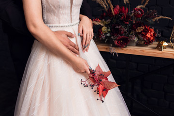 bride in white dress with bouquet of flowers