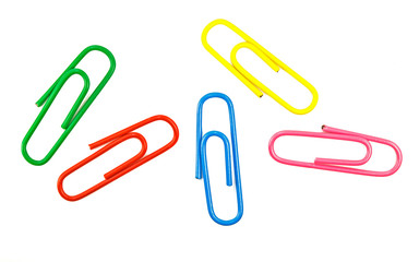 multicolored paper clip on white background, macro.  Colorful paper clip isolated on white background. Color clips for a paper