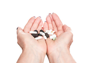 pills in female hands