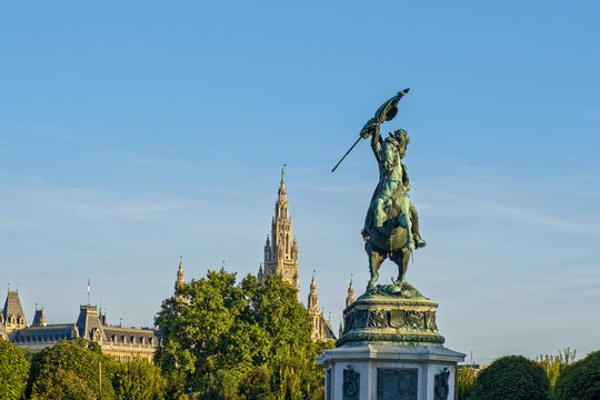Archduke Charles (Erzherzog Karl) monument and town hall at sunrise, Vienna, Austria 