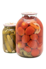 Jars of canned tomatoes and cucumbers