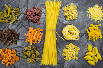 Multicolored pasta close-up. Pasta of different shapes.