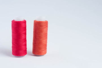 red threads on white background