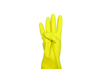 Signs made of yellow protective gloves. Fingers symbol four. Isolated on white. The concept of cleanliness and order.