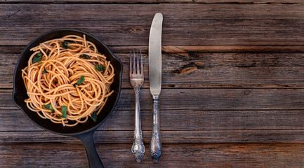 Whole wheat pasta or spaghetti dish with copy space