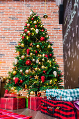 New year tree with gifts at home