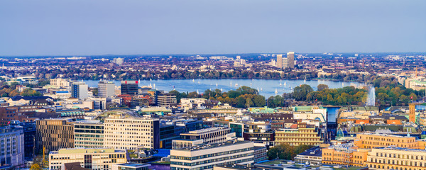 Panoramic aerial view of downtown Hamburg, Germany with the lake Alster on a late summer afternoon.