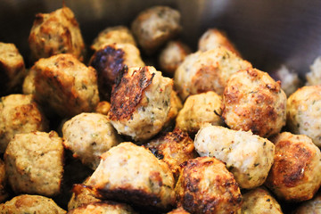 Closeup of a pile of baked meatballs