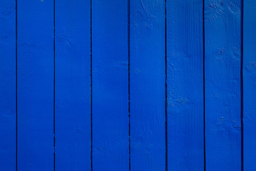 Obraz premium Dark blue painted wooden boards.