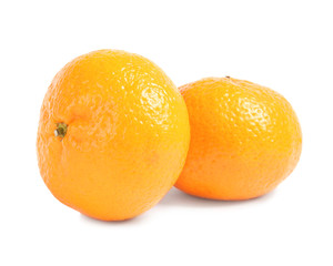 Tasty ripe tangerines on white background. Citrus fruit