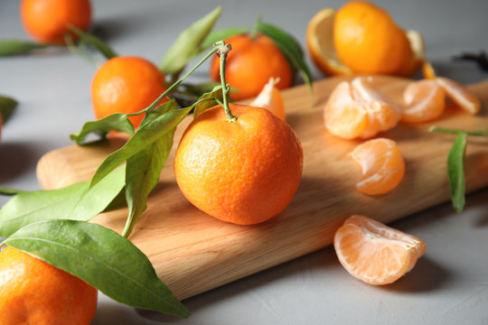 Ripe tangerines on table. Tasty citrus fruit