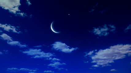 Crescent and many clouds in night sky  . Night sky with stars . Beautiful night . 