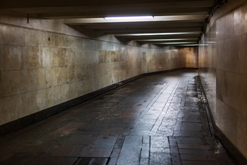 Underpass near the subway in the city in the late evening