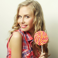 blond  girl with  lolipop