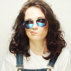 curly woman with sunglasses