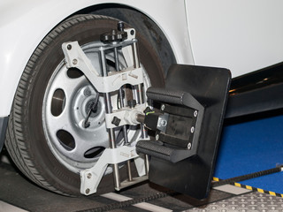 Computer stand to adjust the camber and toe of the car wheels