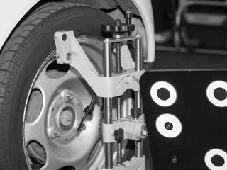 Computer stand to adjust the camber and toe of the car wheels