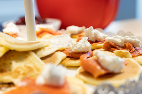 Homemade pancakes with salmon and Robiola cheese for Christmas party