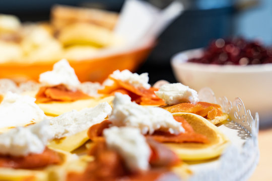 Homemade pancakes with salmon and Robiola cheese for Christmas party