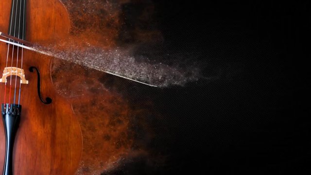 Cello Music Particle Background 4K Loop features a still image of a cello with colored particles streaming away from the instrument over a black design background in a loop 