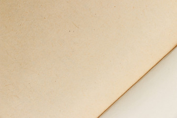 Blank cardboard and paper background. The texture of the surface of old cardboard and the blank background of the old book sheet.