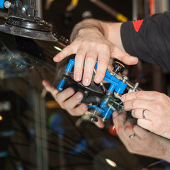 Equipment for repairing a damaged car windshield