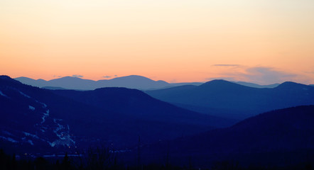 landscape of mountain range under dusk sunlight