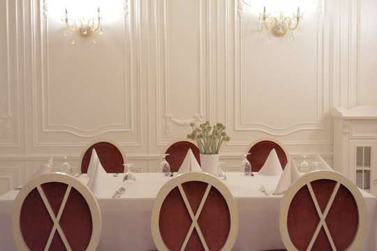 beautifully laid table in the restaurant in classic style