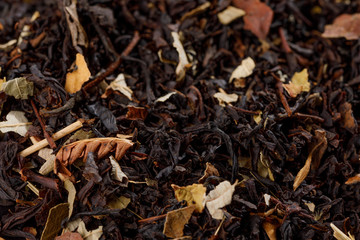 Dry fruit black currant tea leaf texture background. Macro.