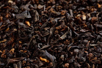 Background texture of loos leaf English breakfast black tea from India.Macro.