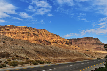 Empty road along the mountains in cloudy weather, Israel