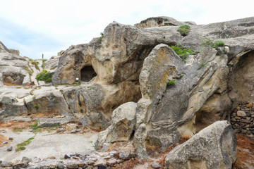 Fototapeta na wymiar Old cave city Uplistsikhe in Caucasus mountains, Georgia