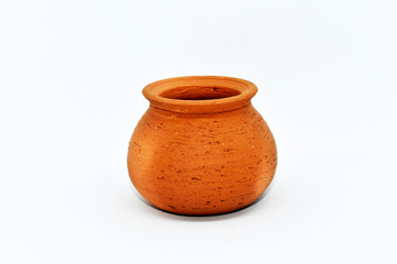 Brown-red terracotta water pot is arranged on a white background.