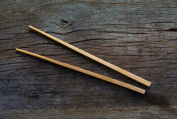 wooden chopsticks on white background