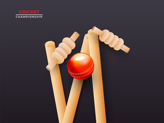 Close view of realistic cricket ball hitting wicket stumps on black background for Cricket Championship.