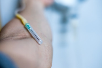 Preparing for blood donations with Hypodermic syringe on arm