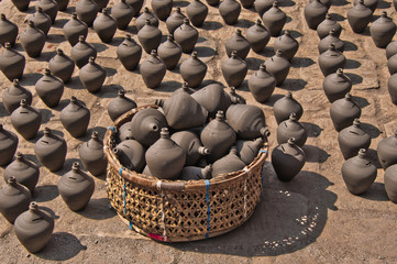 Obraz premium basket and many ceramic bottles. Ceramic Pottery in Potter Square, Bhaktapur Town, Nepal