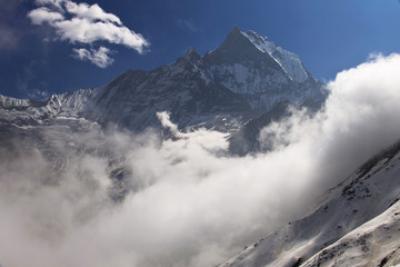 Fototapeta na wymiar Snow mountain Machapuchare from the base camp. Trekking to Annapurna Base Camp
