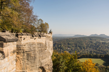 Fototapeta na wymiar Landscape of konigstein fortress Saxon Switzerland, autumn traveling in Saxon Bastille