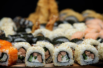 Lot of sushi rolls macro shot.
