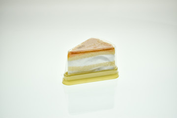 Egg Yolk Thread Cakes stuffed with cream on a white background