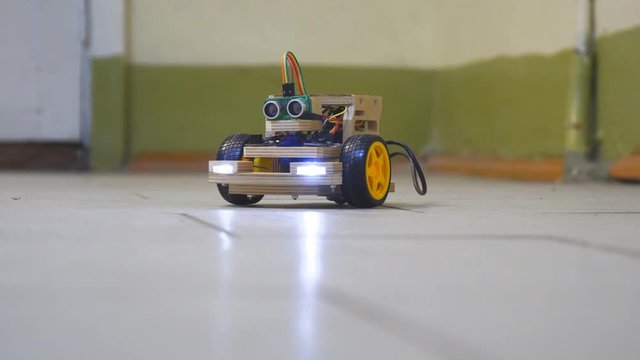 Homemade model cars rides on the floor. Designs the model of the machine or car. Modeling